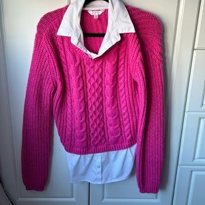 Pink pullover with a white kind of shirt
